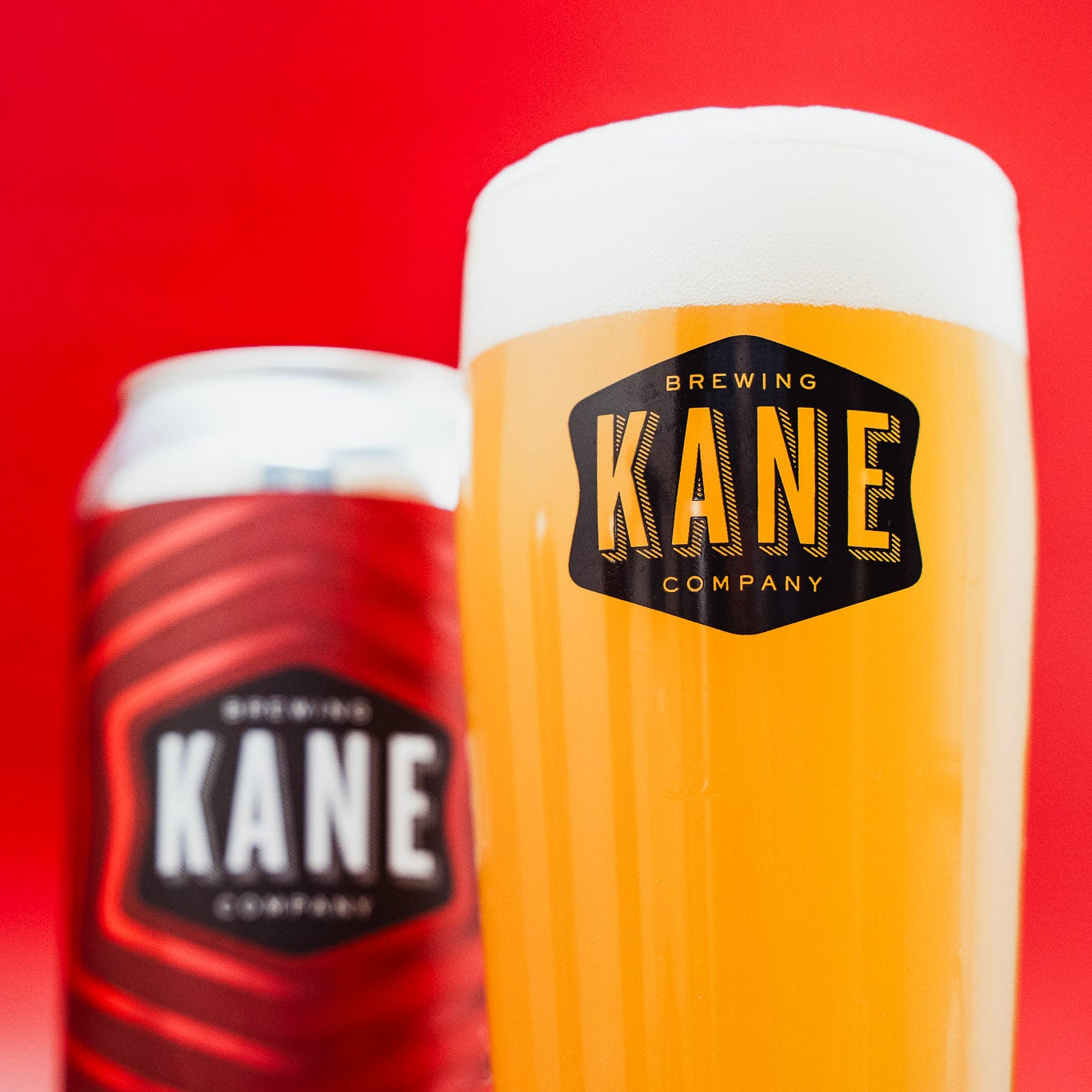 Kane Brewing Company can and glass with a red background