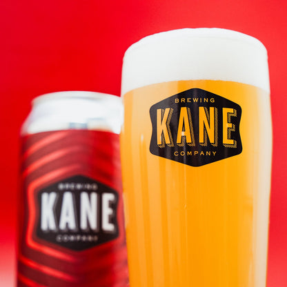 Kane Brewing Company can and glass with a red background